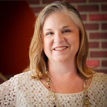 A headshot of Dr. Una Osili.